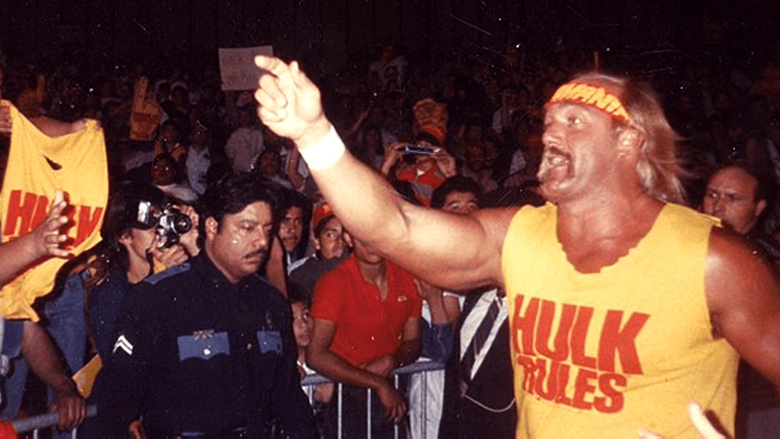 Fan photo of Hulk Hogan walking through the crowd at a WWF show in 1989.