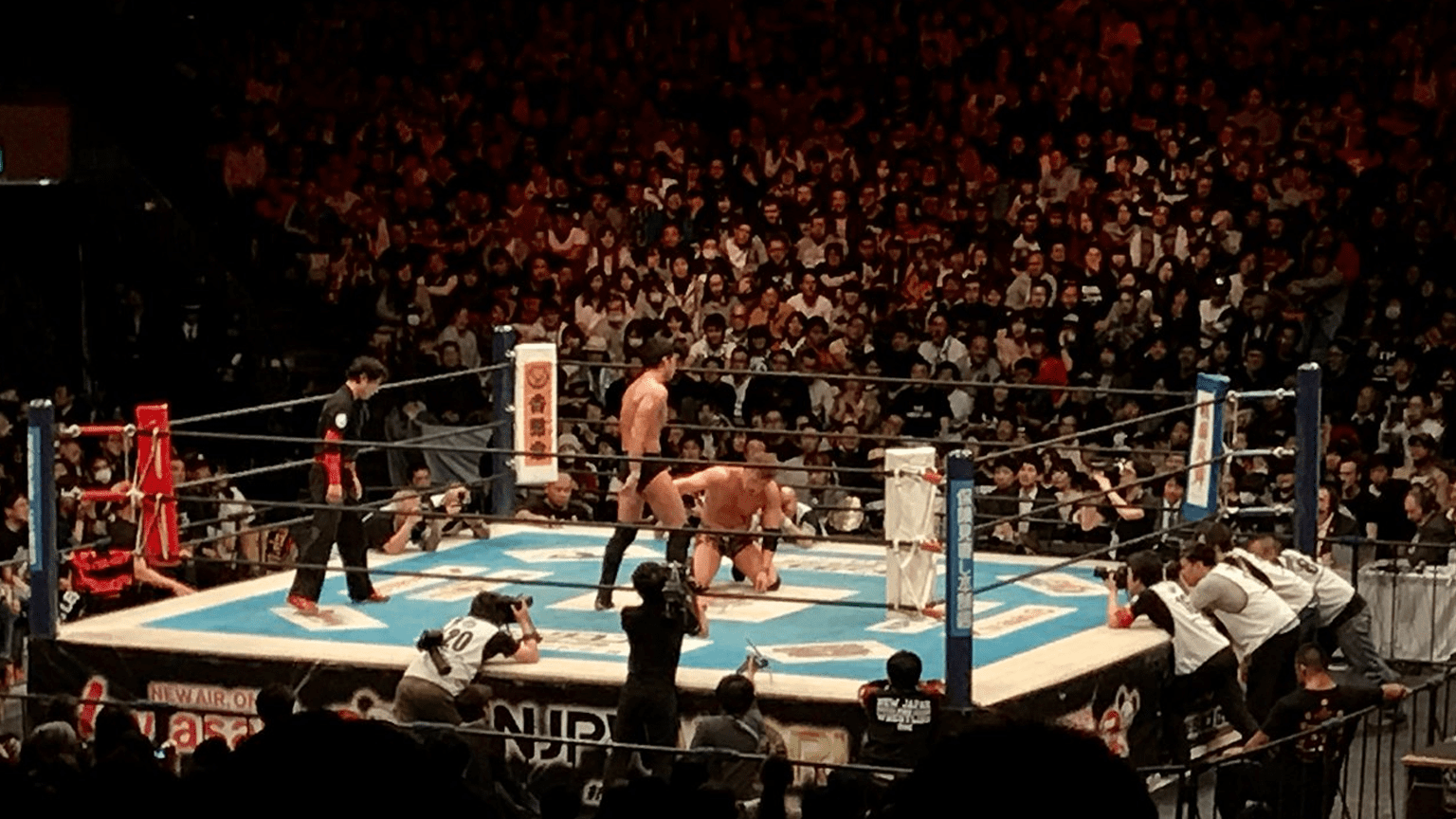 Katsuyori Shibata stands over Kazuchika Okada at NJPW Sakura Genesis 2017.